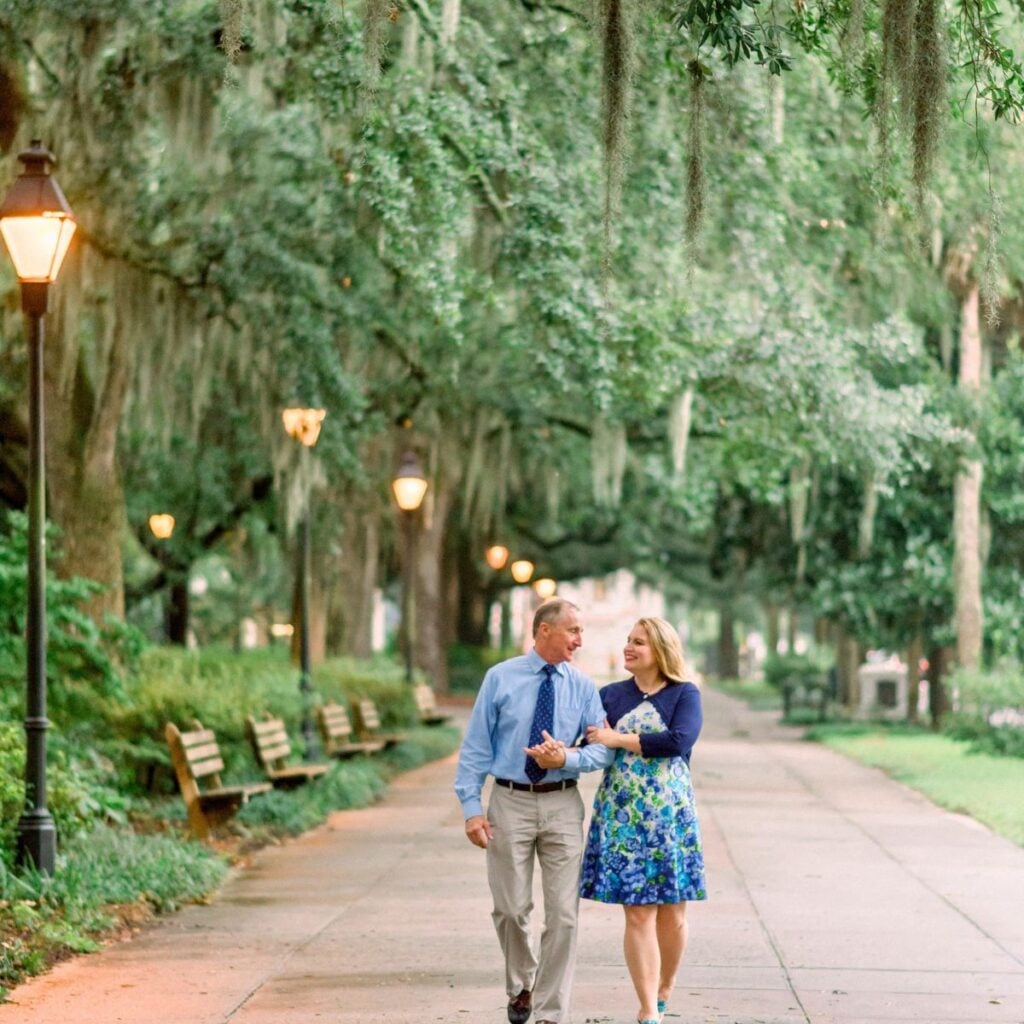 Jennifer & Joe Davis, your Lowcountry travel agent, strolling Forsyth Park in Savannah, GA