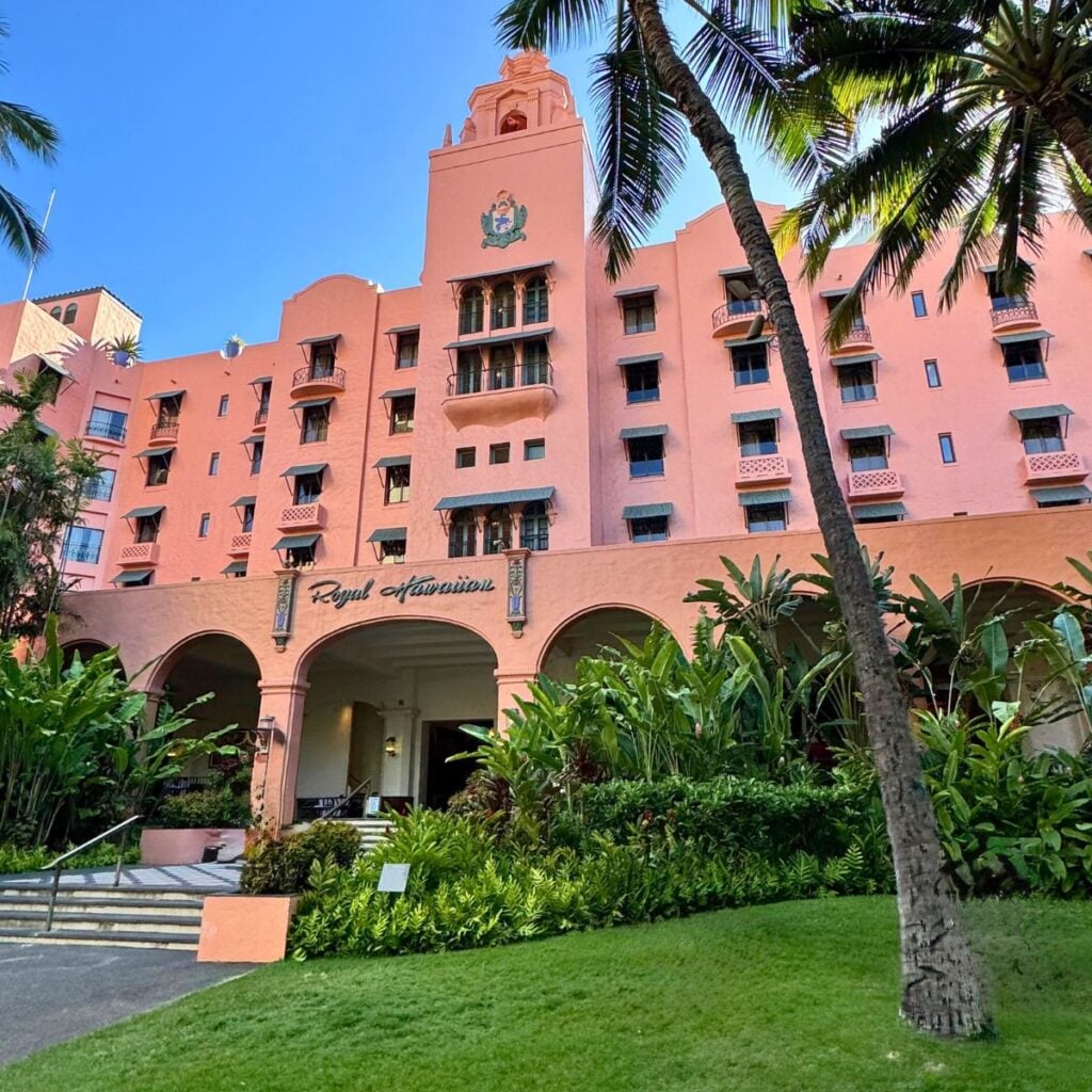 The iconic pink facade of The Royal Hawaiian in Honolulu, Hawaii