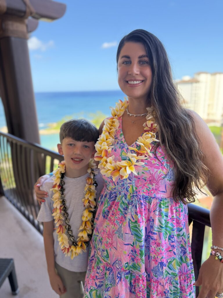 Kayla Zimmerman wearing a lei at Disney’s Aulani Resort in Hawaii