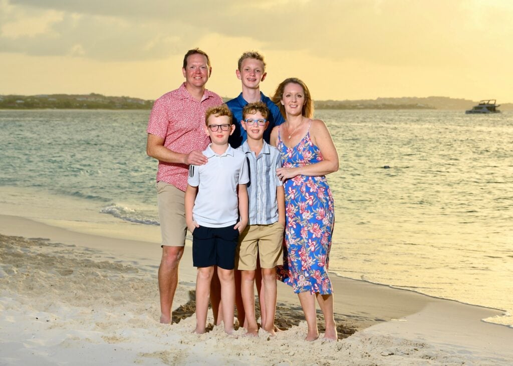 Ashley Belanger and her family on the beach at Beaches Turks and Caicos